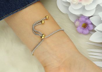 Odkryj bransoletkę Nomination Milleluci z unikalnym złotym odciskiem łapy (028018013). Elegancka biżuteria ze stali szlachetnej i złota – idealna na prezent dla miłośników zwierząt!.jpg